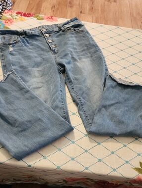 High-Rise Light Blue Flare Jeans with Button-Fly